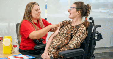 MSWA Nurse giving an injection to an MSWA Client.