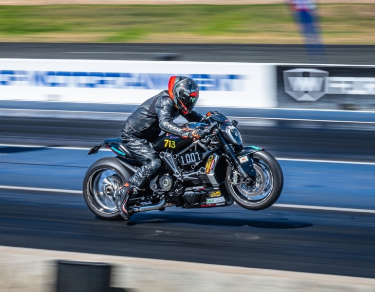 chris racing on a motorbike