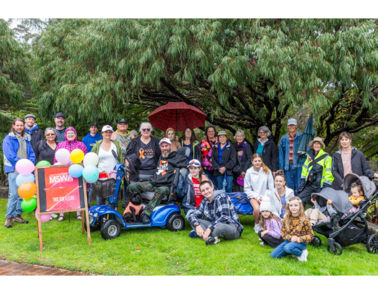MSWA Client, Daniel at his walk fundraiser with his family and friends.