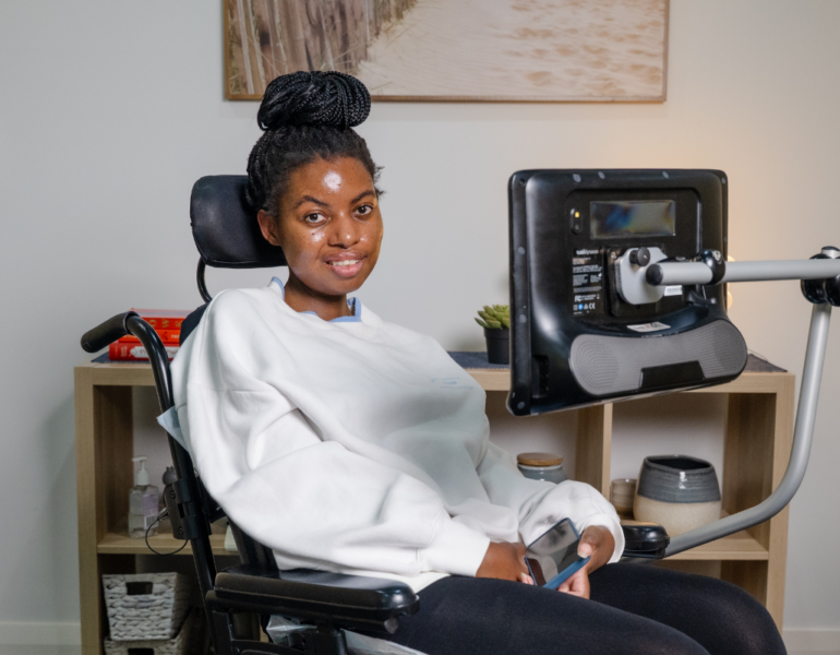 MSWA Client Elena sitting in her wheelchair.