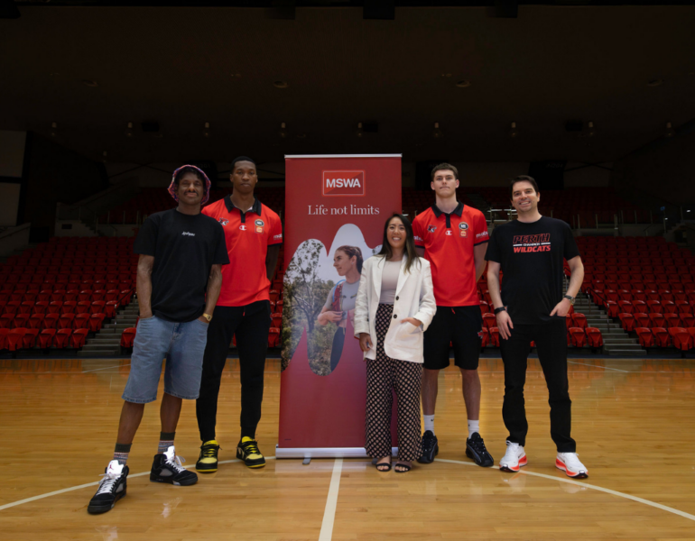 MSWA Client and staff with the Perth Wildcats team.