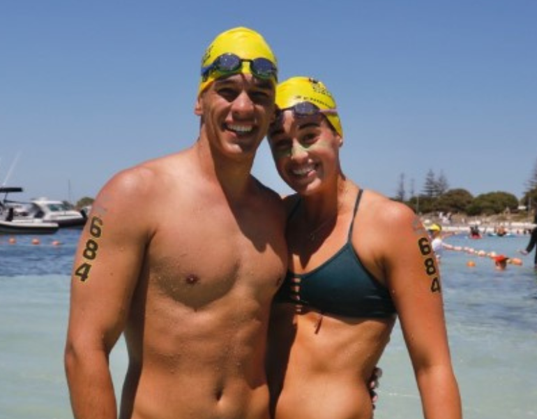 Fundraisers posing at the beach