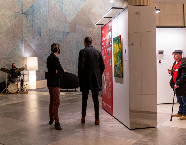 people visiting the exhibition at central park in occasion of world ms day