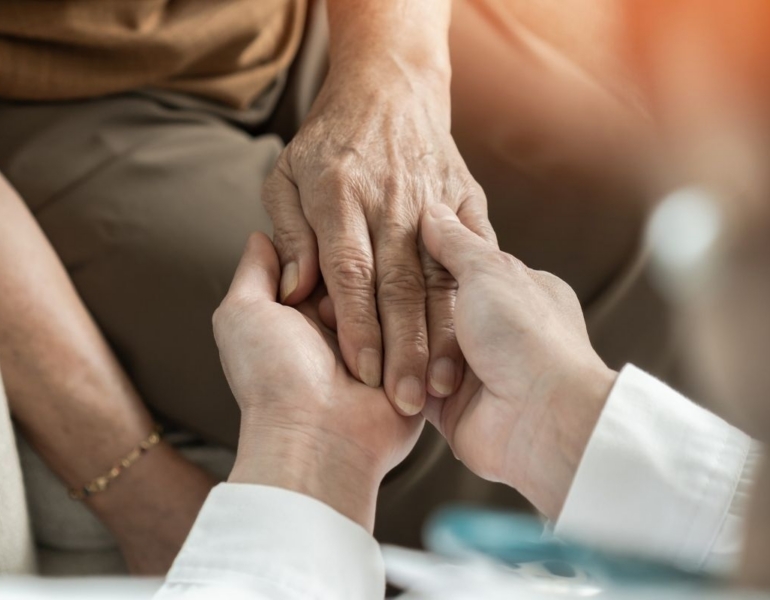Stock image of holding hands.