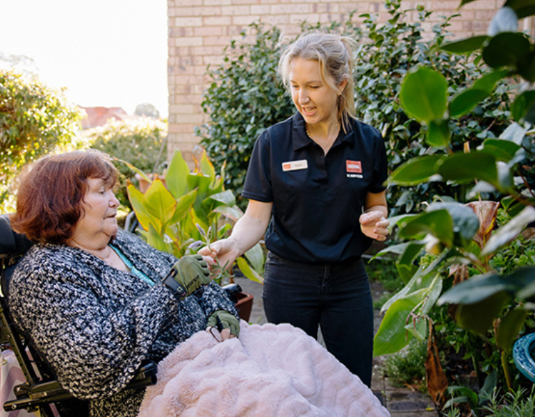 Client and staff in garden