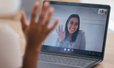 Two people greeting each on a video call