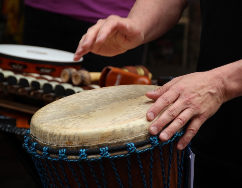 Two hands drumming.