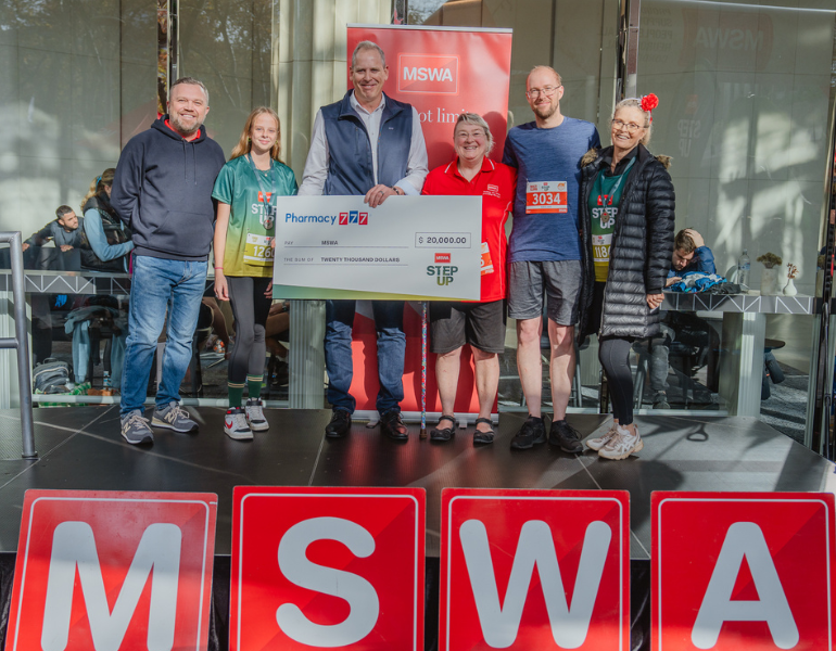 MSWA participants posting with a large cheque from sponsor Pharmacy 777