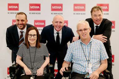 Group of people smiling at the camera