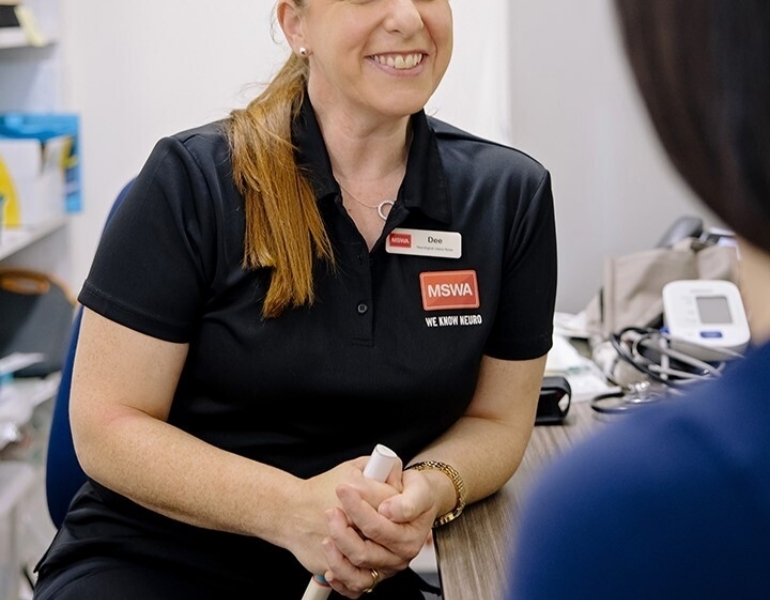 woman smiling at the camera