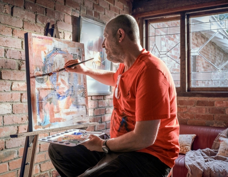 man painting