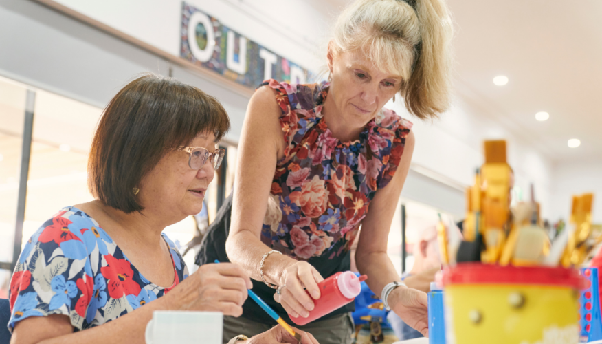 two women during an arts and crafts session