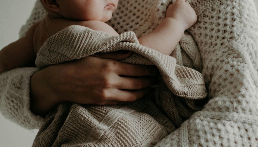 New mum holding her baby