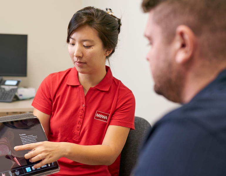 Speech therapist with client