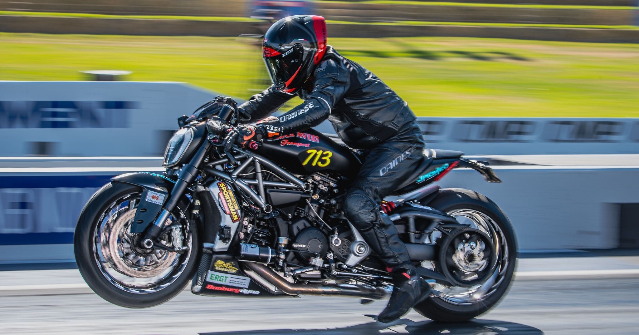 Chris racing on a motorbike