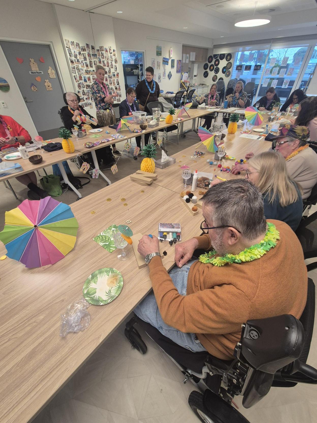 Gathered around the table doing activities.